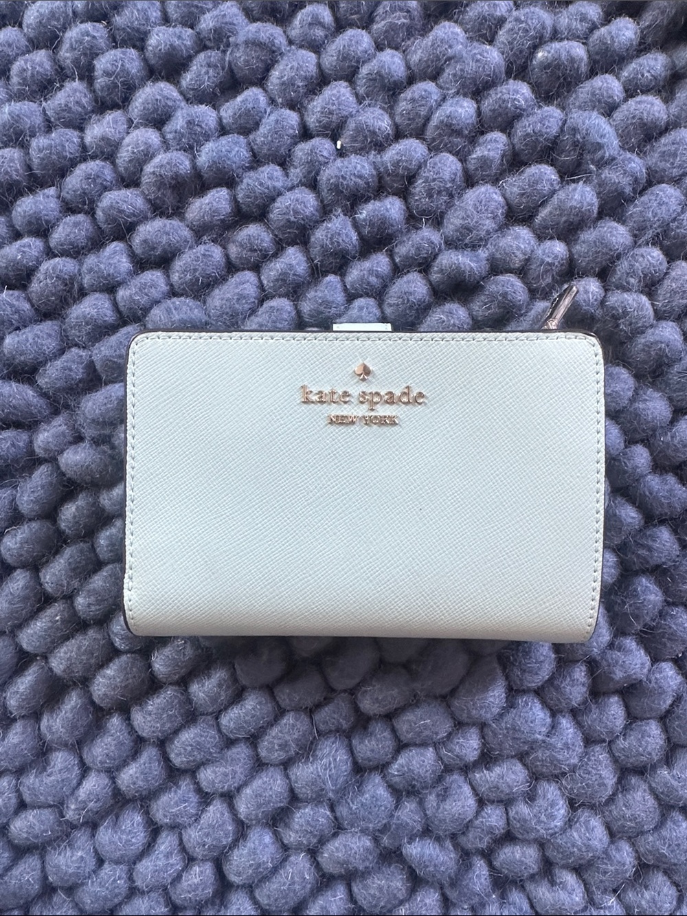 kate spade pastel blue Saffiano leather zip wallet with gold logo